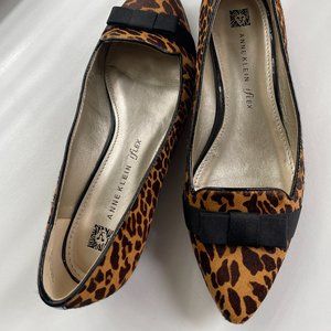Never-worn leopard flats with black accents